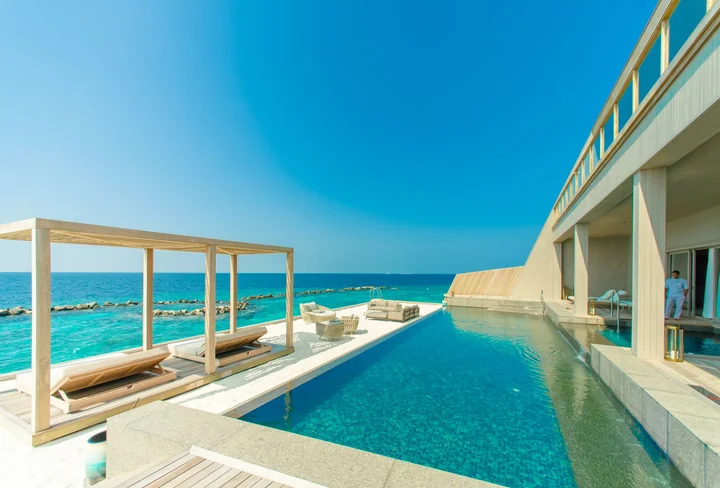 An infinity pool looking out over the sea