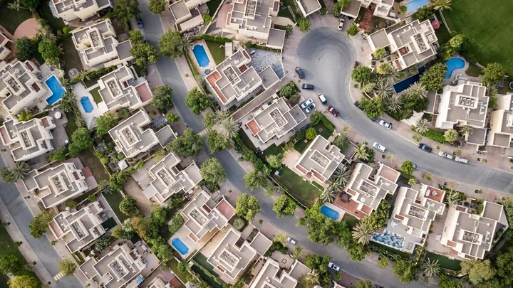 An aerial view of a housing estate and its streets