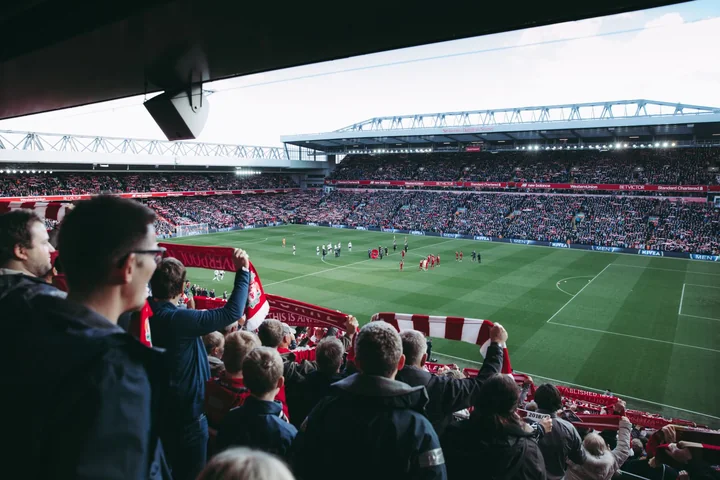A packed football stadium during a match