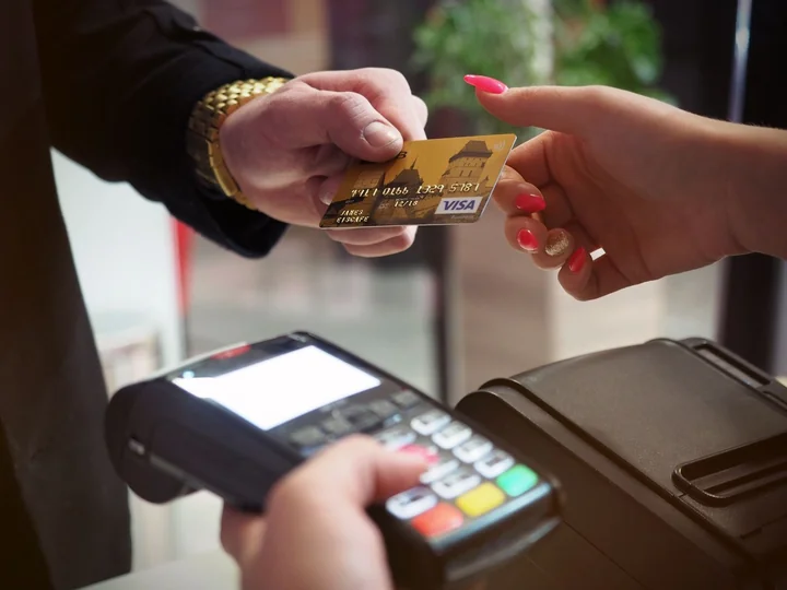 A card being tapped on a payment terminal