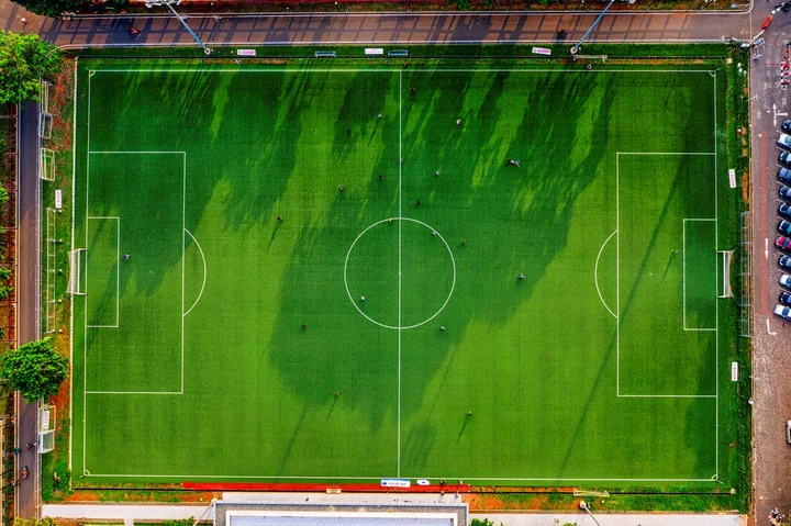An aerial view of a marked football pitch