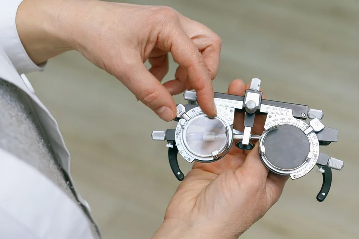 A precision optical instrument held in both hands