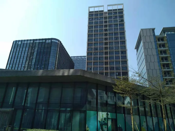 Modern glass office towers seen from below