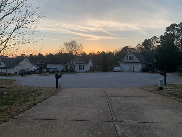 A quiet suburban street at dusk