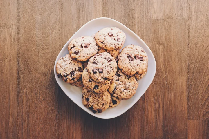 Home-baked cookies on a plate on a wooden table
